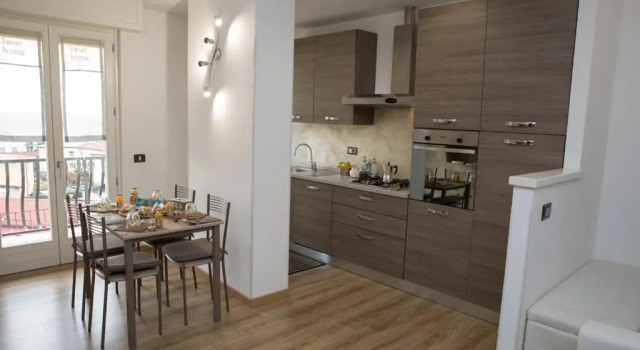 Апартаменты Carrara Hospital Home