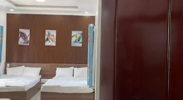Кровать в общем номере Kim Ngân Motel