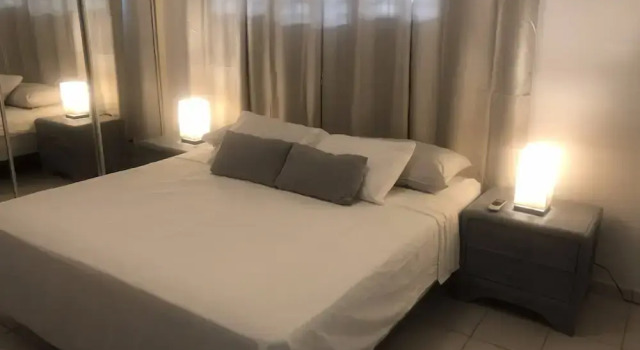 Апартаменты с 2 комнатами с балконом Cozy one-bedroom & mezzanine apartment