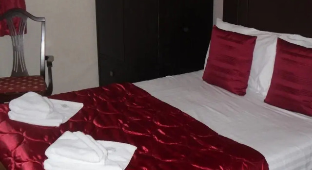 Четырёхместный номер Standard Richmond Hotel
