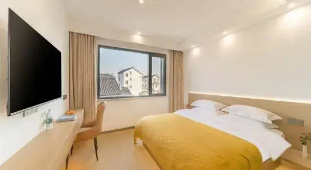 Кровать в общем номере Suzhou Manbuli Homestay