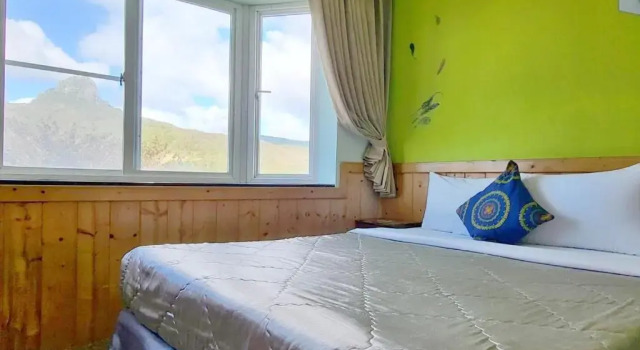 Четырёхместный номер Standard с видом на горы Xing Ji Hotel