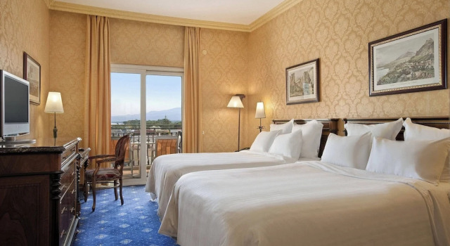 Двухместный номер Deluxe с балконом и с частичным видом на море Отель Delta Hotels by Marriott Giardini Naxos