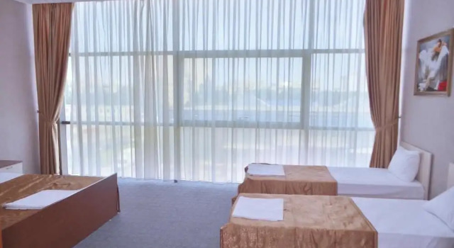 Четырёхместный номер Classic Отель Riva Inn Баку