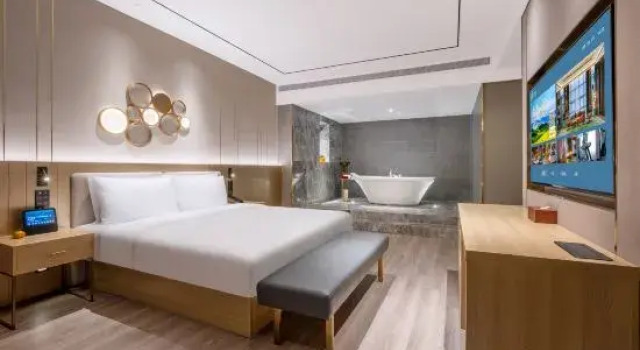 Люкс Business Orange Hotel (Yingtan Railway Station Xinjiang South Avenue)