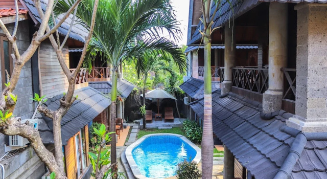 Коттедж с 2 комнатами с балконом Villa Happy Jimbaran