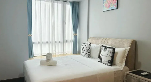 Номер Luxury с 2 комнатами с балконом R&F Superior Homestay By Han Lin Sojourn