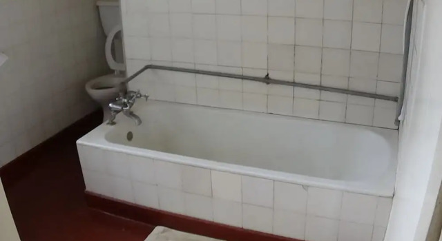 Bett im Wohnheim Kolping Guest House