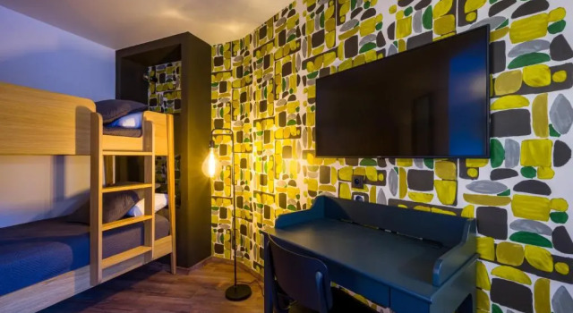 Кровать в общем номере LOuta Hotel Restaurant