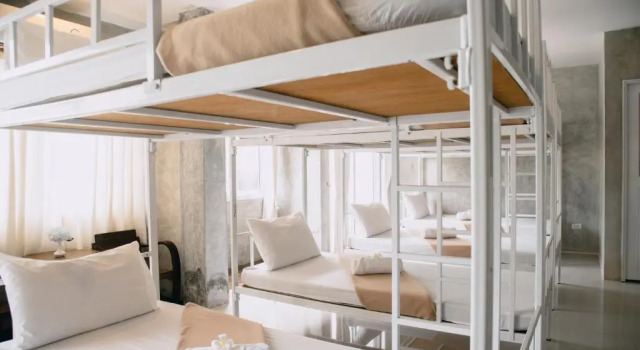 Кровать в общем номере Ban's Avenue Guest House