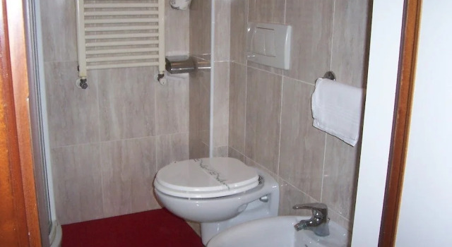 Standard Neljän hengen huone Hotel Caldin's