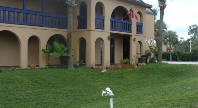 Кровать в общем номере Sevilla Inn Kissimmee- Near Disney