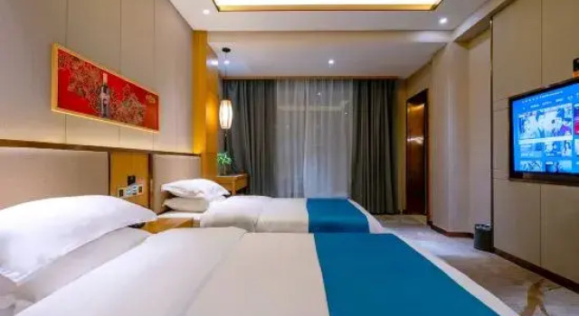 Люкс Deluxe Lüchun Wenhui Hotel (Lüchun Bus Terminal Branch)