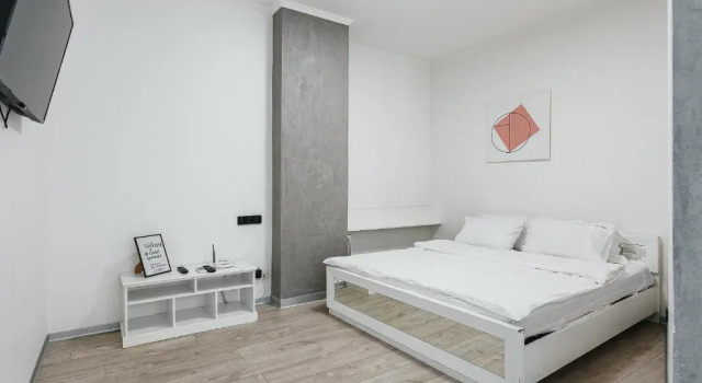 Апартаменты At Home Apartment