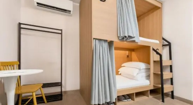 Кровать в общем номере (мужской номер) ORAN HOTEL（Jiang Nan Xi And Bao Gang Da Dao Subway Station)