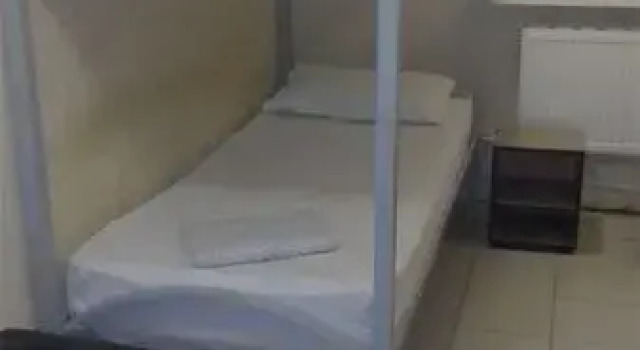 Кровать в общем номере Гостиница Гавань