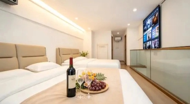 Люкс Hailan Movie Apartment (Tianhe Airport Aviation Headquarters Subway Station)