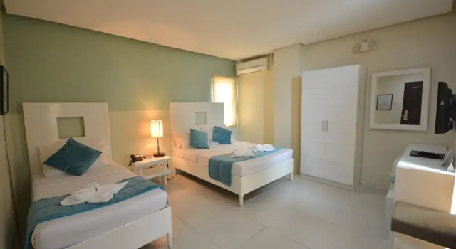 Люкс Holiday Suites Business District - formerly Empire Suites Hotel