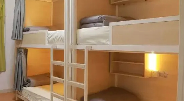 Кровать в общем номере (женский номер) Цокольный этаж Shiye Youth Hostel