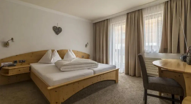 Апартаменты Hotel Garni Chasa Nova