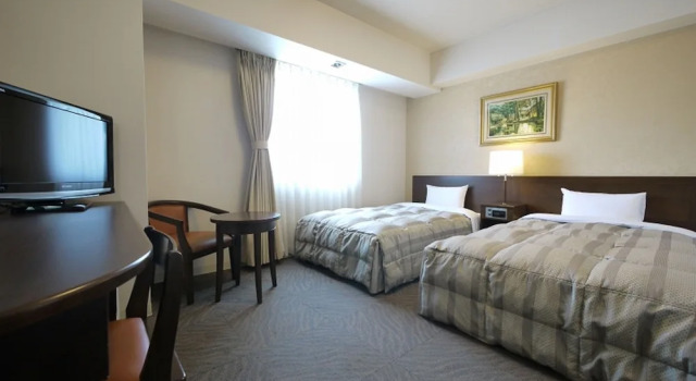 Кровать в общем номере (женский номер) HOTEL ROUTE-INN Ota Minami -Kokudo 407 Gou