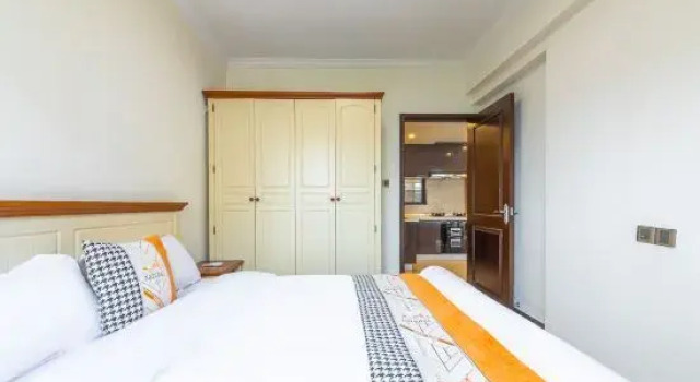 Люкс c 1 комнатой Guanjia Holiday Apartment (Haikou Mission Hills New Town Duty Free Shop)