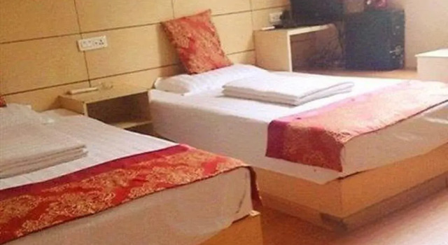 Hexie Business Hotel, Prenota Hotel Huaying Sichuan