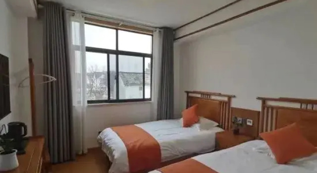 Семейный люкс Jiuhuashan Muqinju Guesthouse