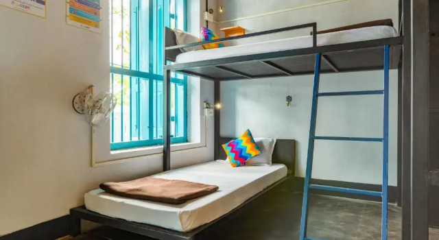 Кровать в общем номере goSTOPS Lite Alleppey