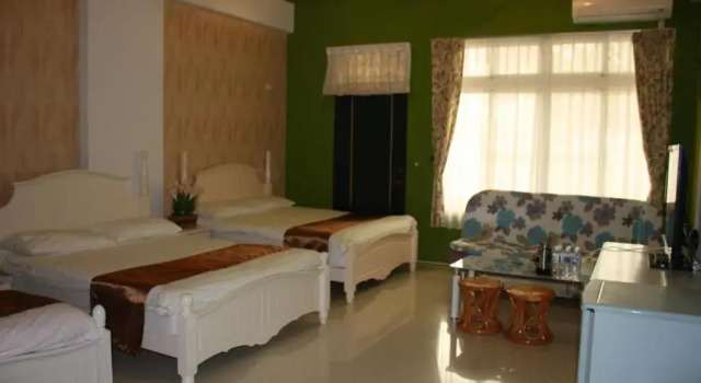 Люкс NiHuiHoung Bed and Breakfast