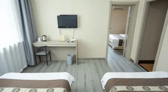 Люкс Business Caizheng Hotel