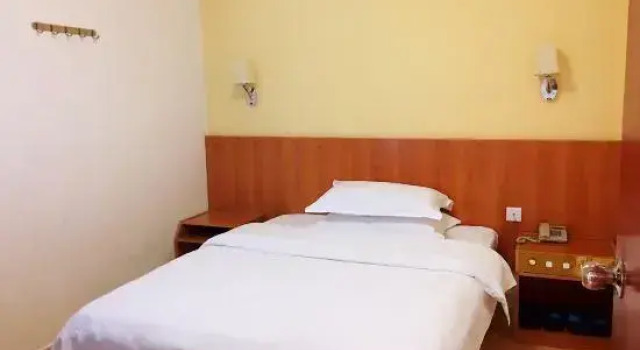 Четырёхместный люкс Business Dongfang Hotel