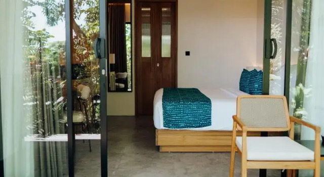 Camera doppia Deluxe con balcone e con vista sul giardino Deep Roots Dive & Yoga Resort
