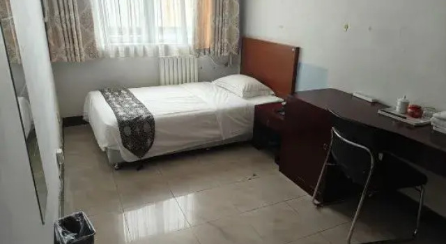 Кровать в общем номере с 3 комнатами Beijing Post and Telecom Conference Centre Hotel