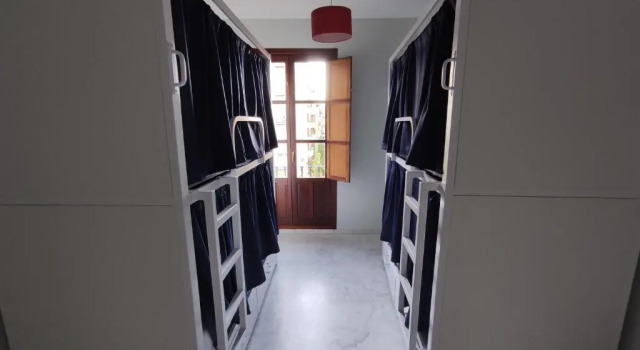 Кровать в общем номере New Samay Hostel