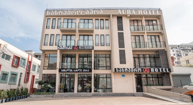Отель Aura в Дигоми