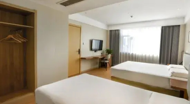 Семейный люкс Business Xingfuli Hotel (Yongcheng Jinbo Hotel)