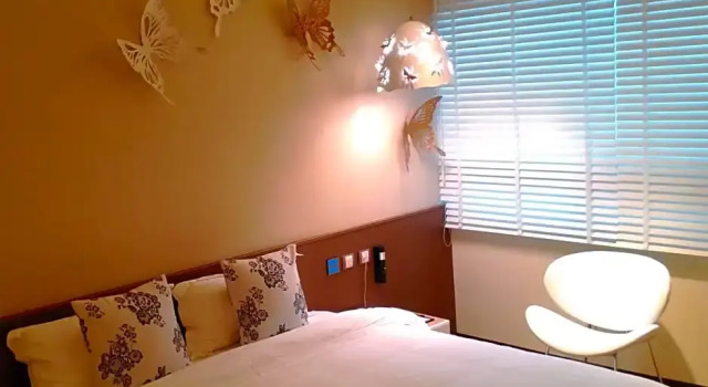 O podwyższonym standardzie pokój Walker Hotel Ximen