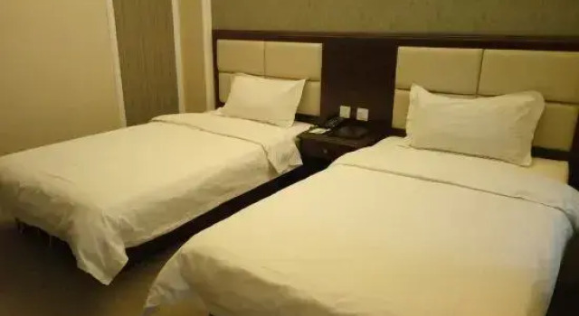 Taike Business Hotel, Reservar Hotel Daqing Heilongjiang