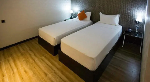 Isabela Zen Hotel & Restaurant Corporation, Buchen Sie Hotel San Andres Philippinen