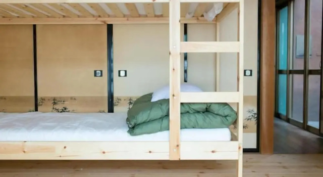 Кровать в общем номере Nikkosan BackPackers Inn - Hostel