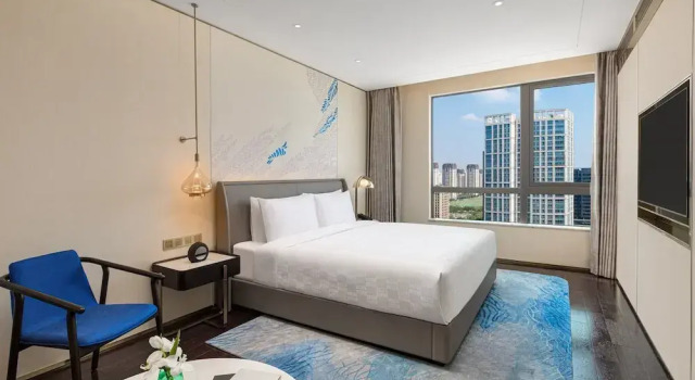Люкс Dining Area c 1 комнатой с видом на озеро HUALUXE Shanghai Changfeng Park by IHG