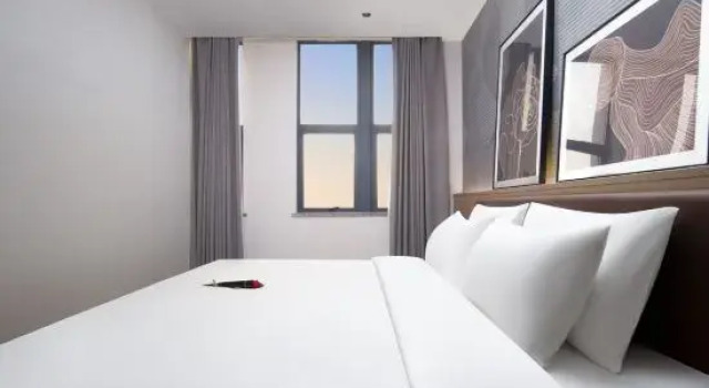 Люкс Executive NaIdue Inn , Jingjiang Xingangcheng