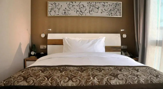 Standardowy dwuosobowy pokój Dayi Yihao Hotel