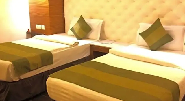 Кровать в общем номере Hotel Ivory 32
