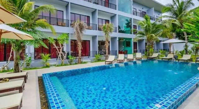 Кровать в общем номере Baan Phu Chalong Place