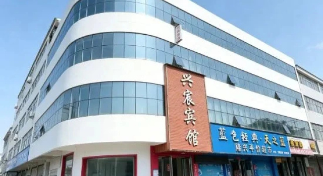 Guangshan Xinglong Hotel, Book Hotel Hoteller i Henan med parkering, Parkering