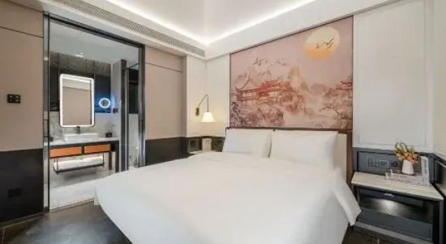 Четырёхместный семейный люкс Zhenyue Meijing Hotel (Qinzhou Baishihu Park Wuyue Plaza)