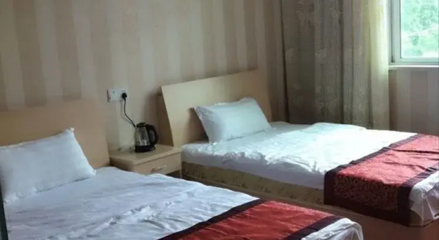 Yixing Xinlong Inn, Prenota Hotel Wuxi Jiangsu