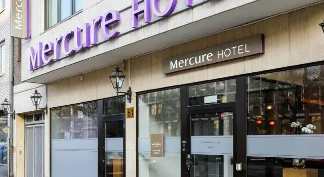 Кровать в общем номере Mercure Hotel Düsseldorf City Center